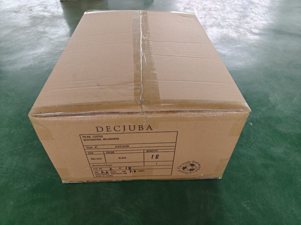 Custom bag export carton inspection with carton label quantity color destination and sealing check.