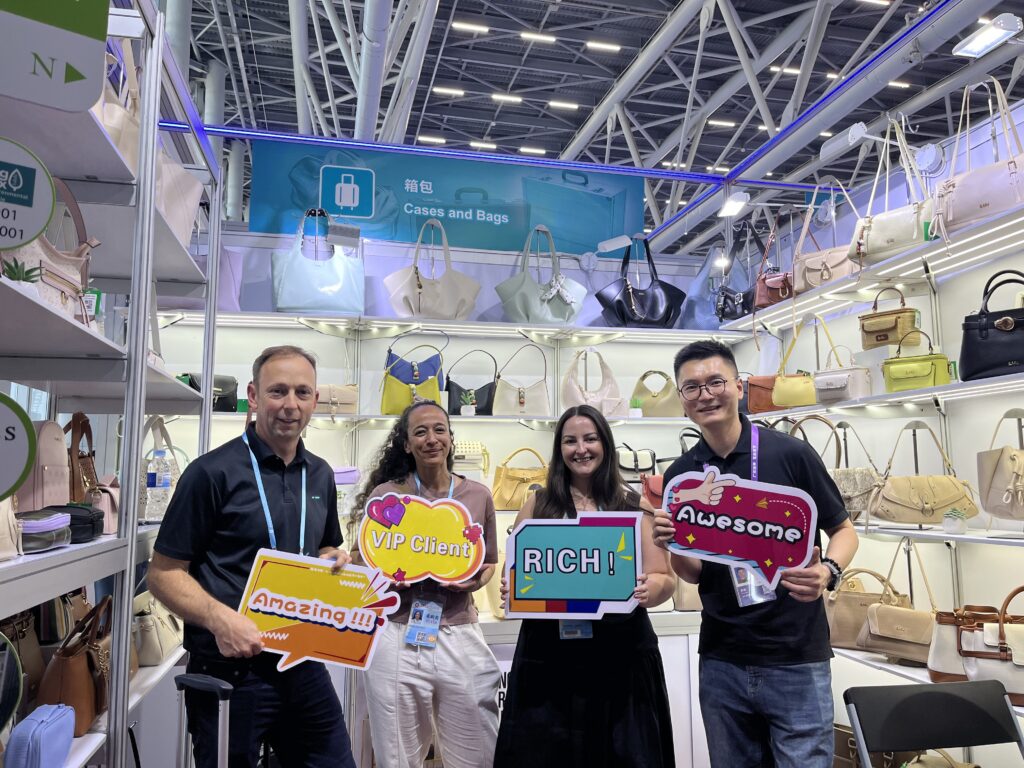 Buyer evaluating China bag suppliers at the Canton Fair cases and bags section